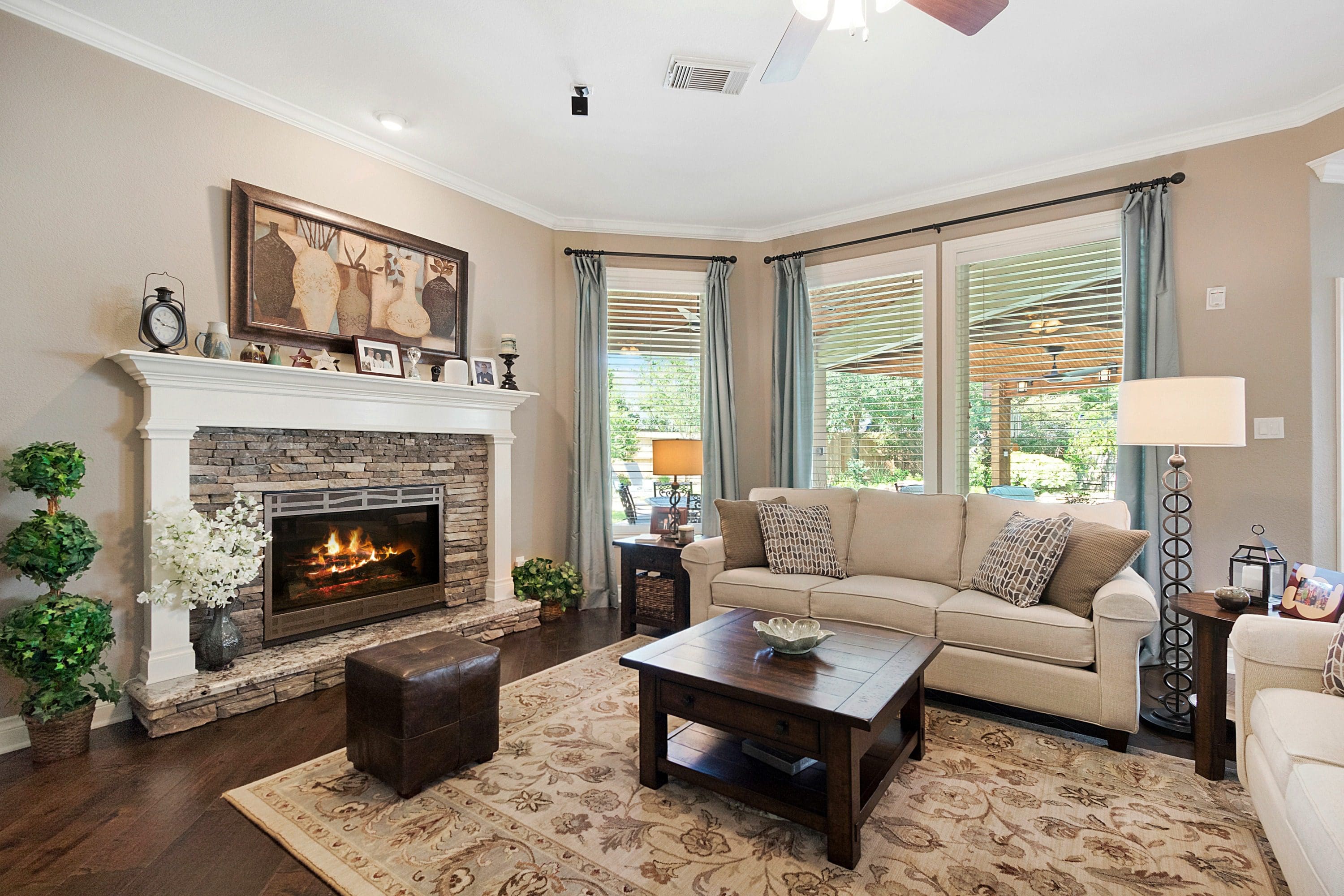 A living room with a fireplace and a couch