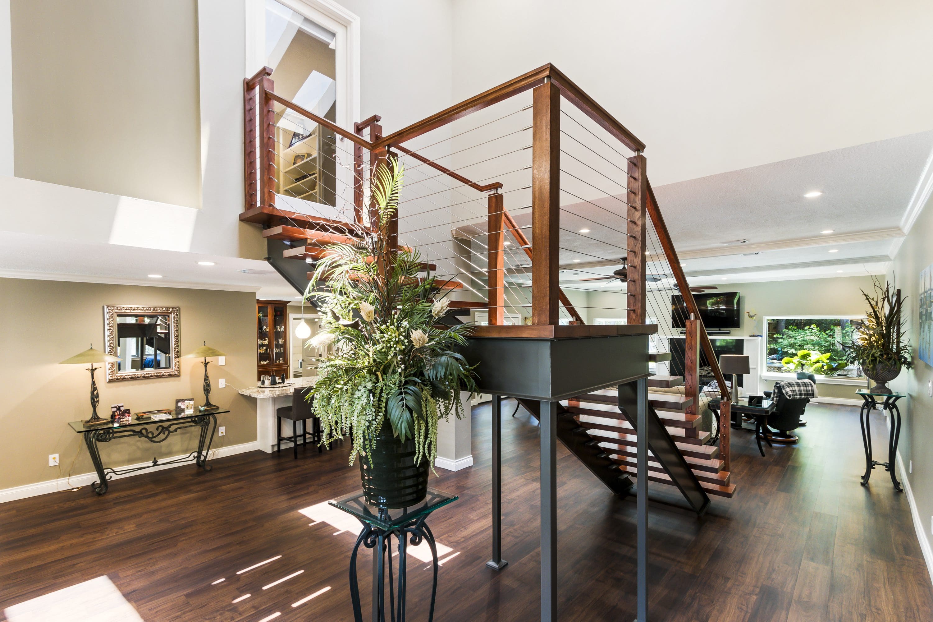 A large open staircase in the middle of a room.