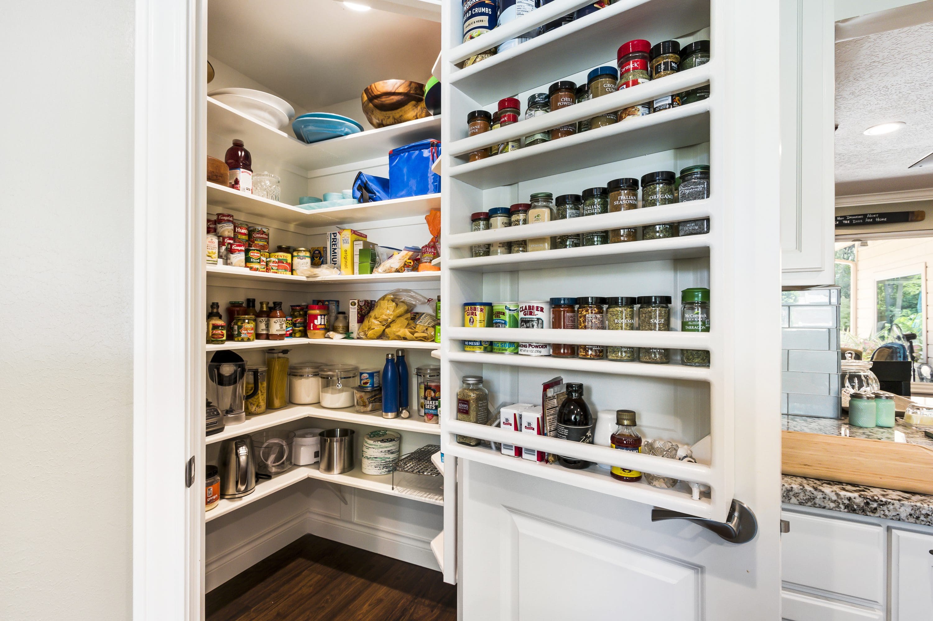 A pantry with many different types of food.