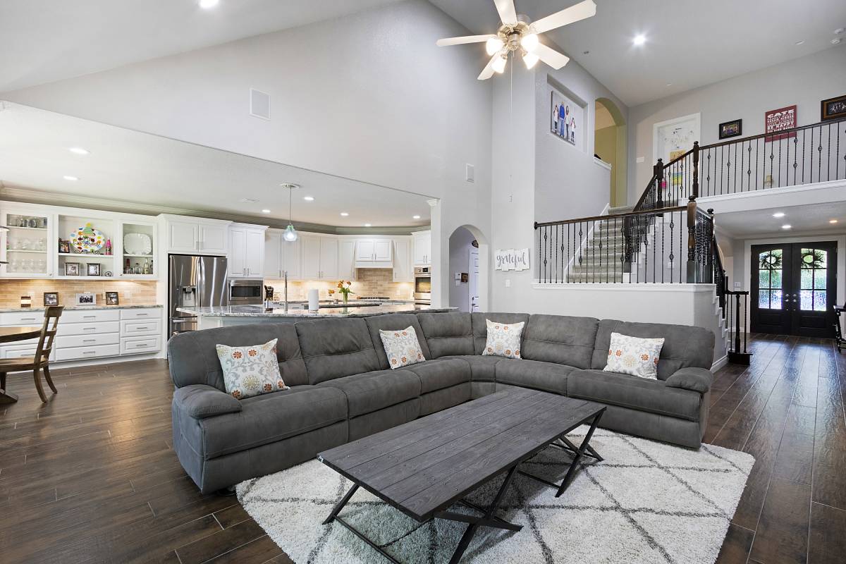 GettyImages-901157728 (1) A living room with a couch and table in it