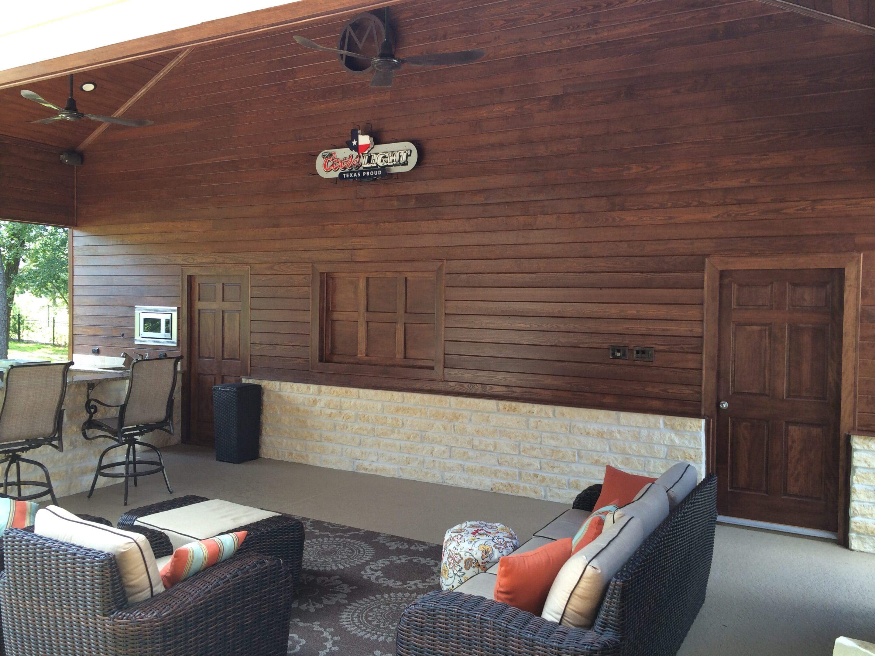 A living room with couches and chairs in it
